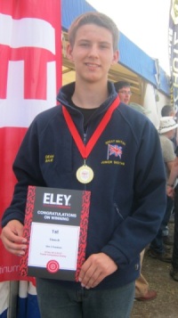 Dean with his medal and certificate